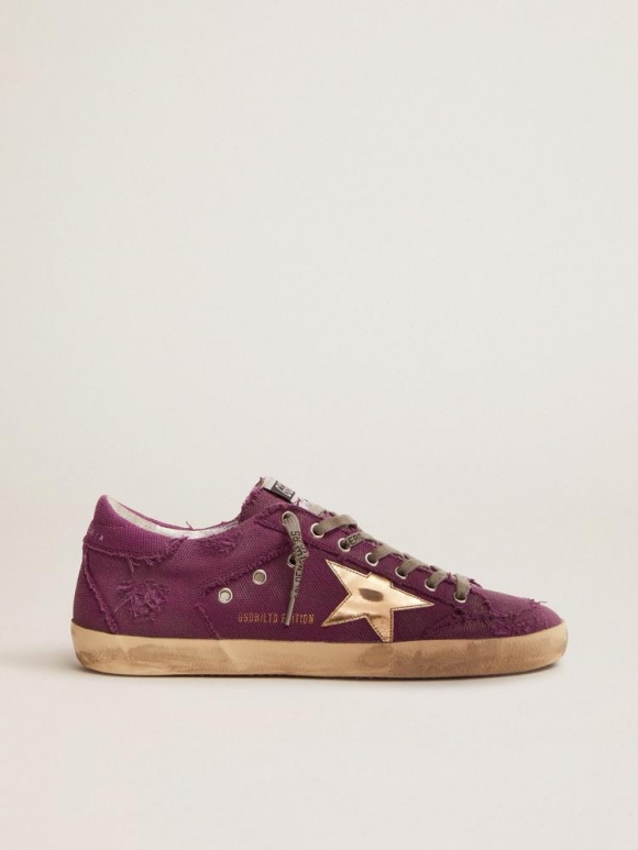 Women??s Super-Star Penstar LAB sneakers in purple distressed canvas with gold laminated leather star