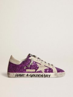 Super-Star sneakers with purple glitter and lettering on the foxing